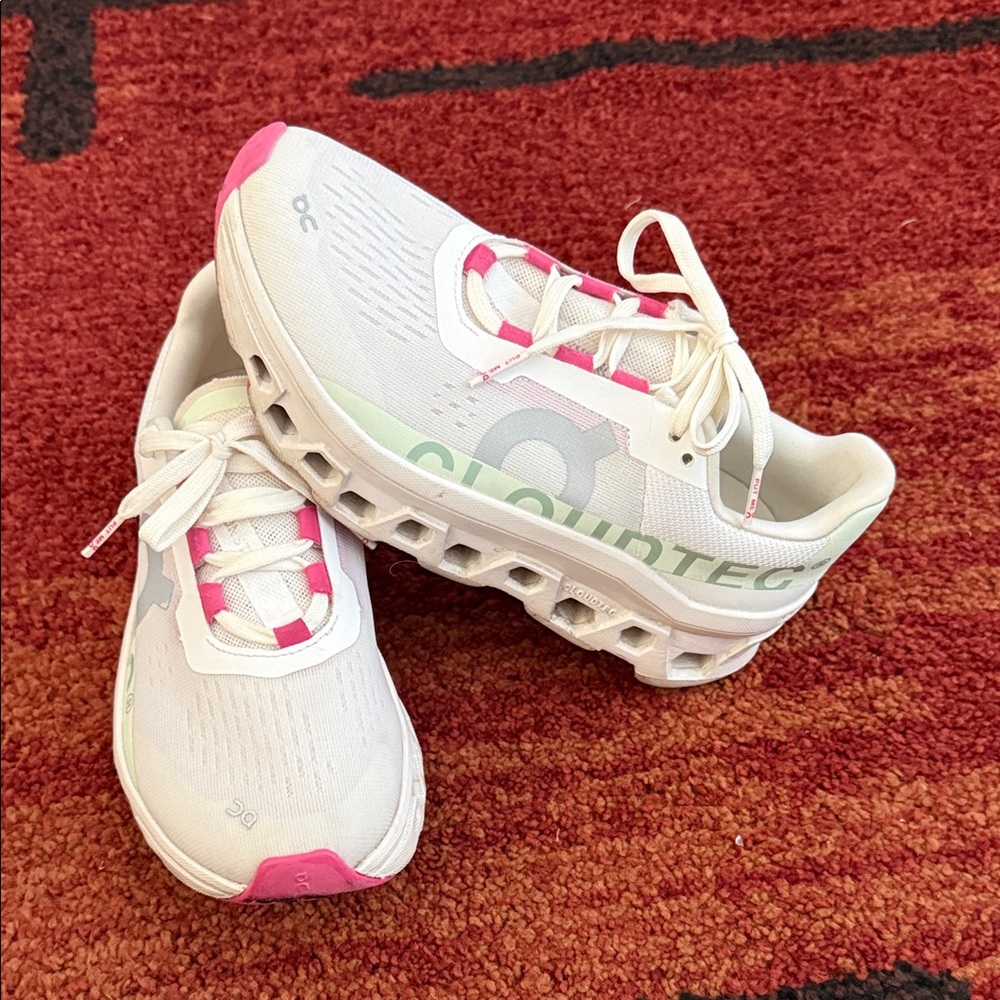 On Running White and Pink Sneakers